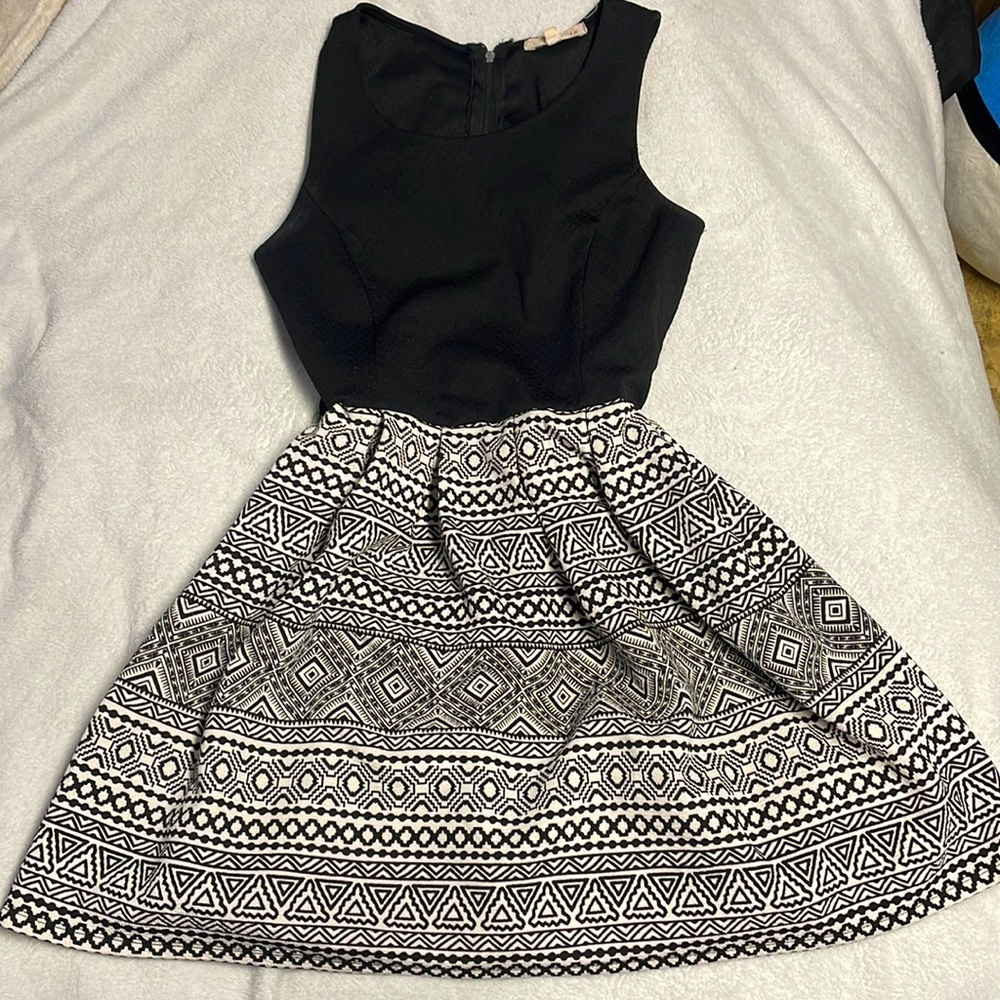 Large black and white patterned skater dress